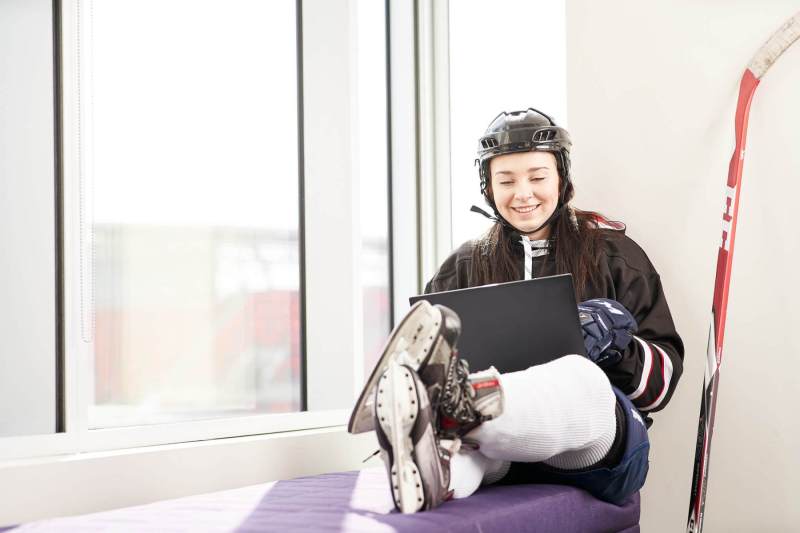 Hockey player reviews weekly reports