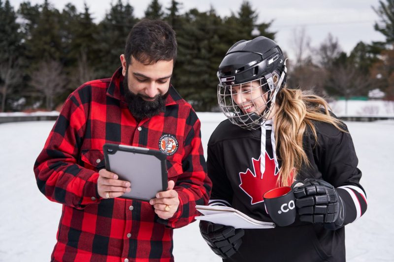 Hockey player and lumberjack prepare for presentation