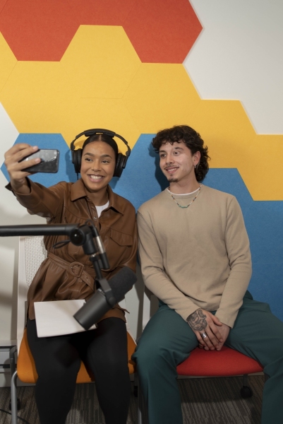 Podcaster takes selfie with interviewee