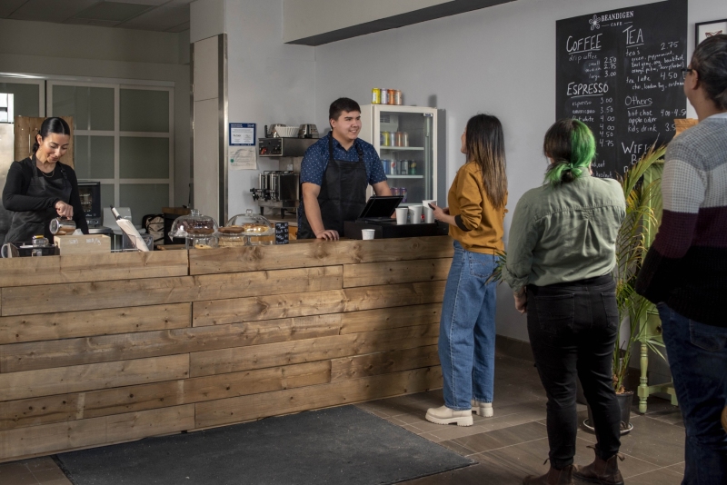 Customers in line at a coffee shop
