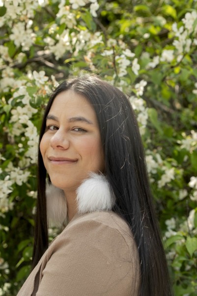 Woman surrounded by flowers